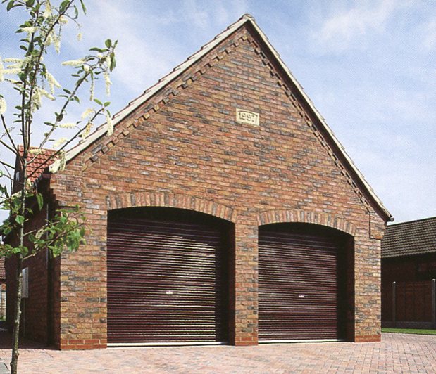 Picture of Steel-line roller garage doors in Mahogany wood laminate finish
